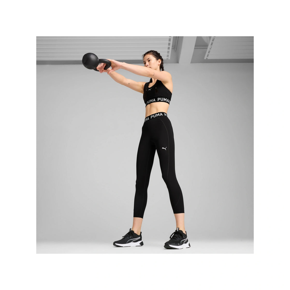 سروال PUMA STRONG الضيق للنساء